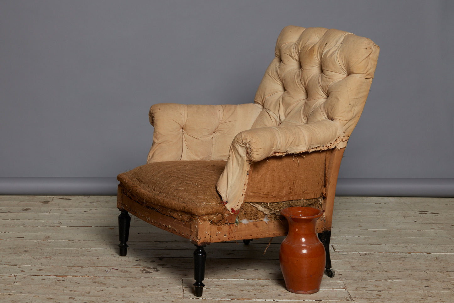 French Upholstered Armchair with a Tufted Back