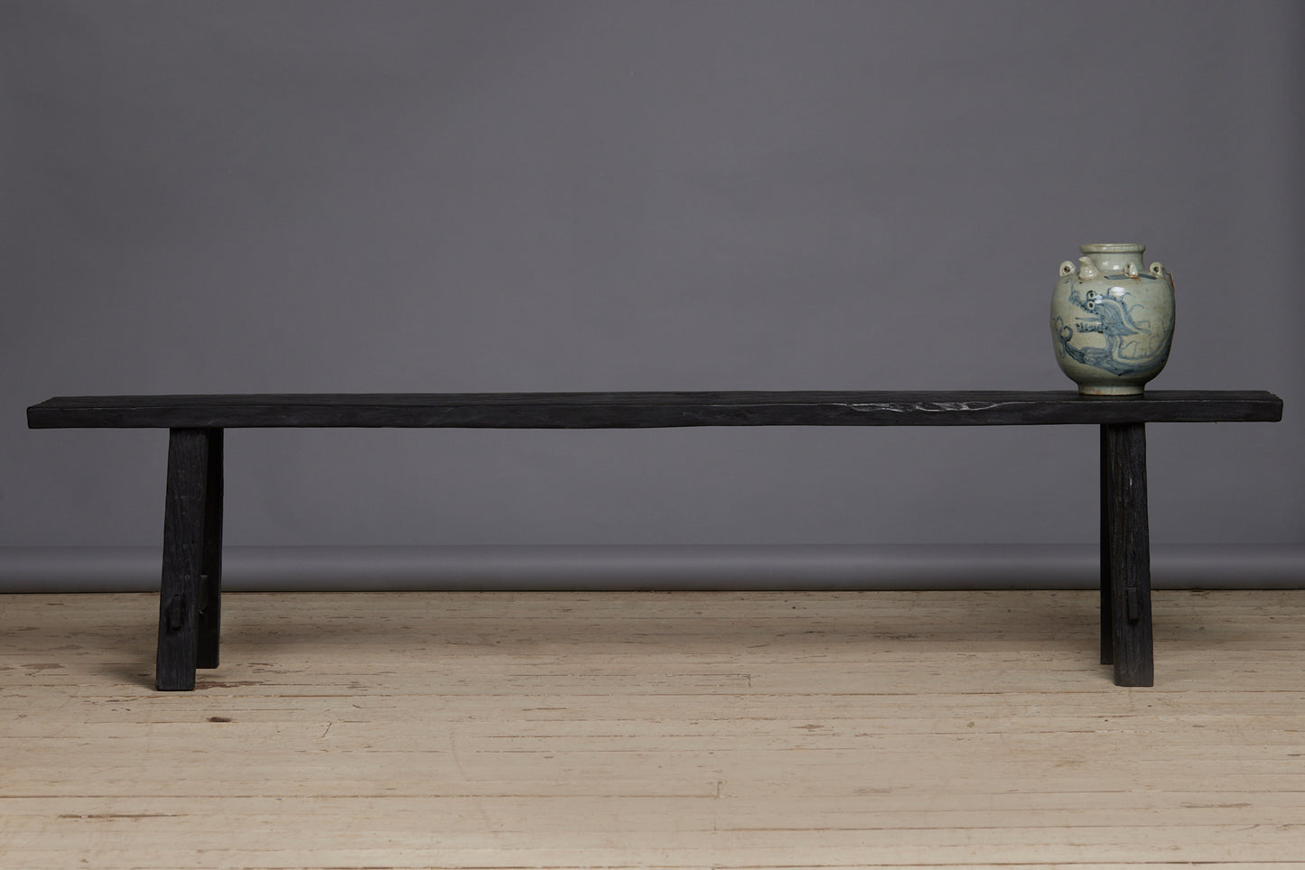 Ebonized Teak Bench with a Stretcher Base