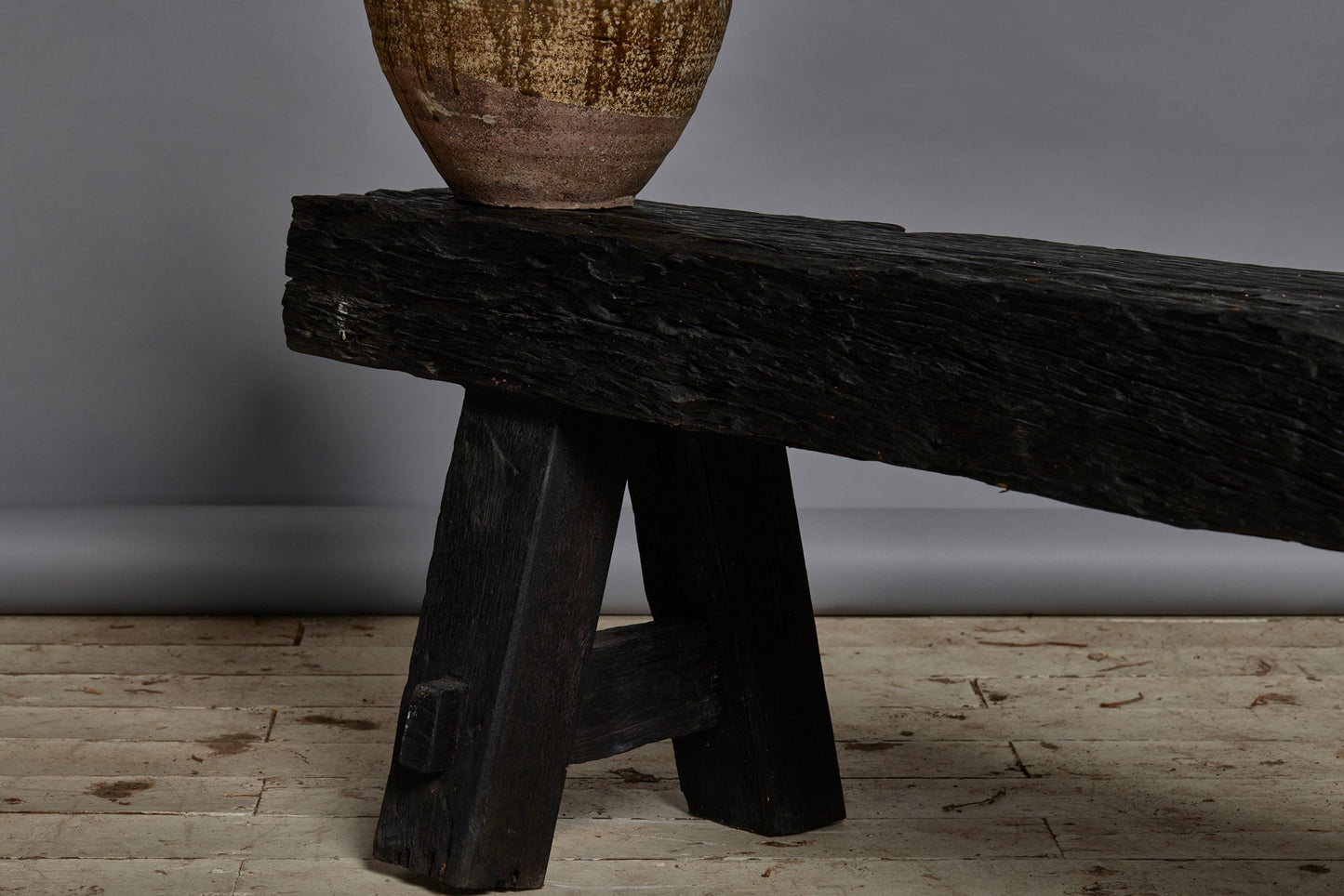 Long Chunky Top Ebonized Teak bench constructed from Bridge parts from Borneo
