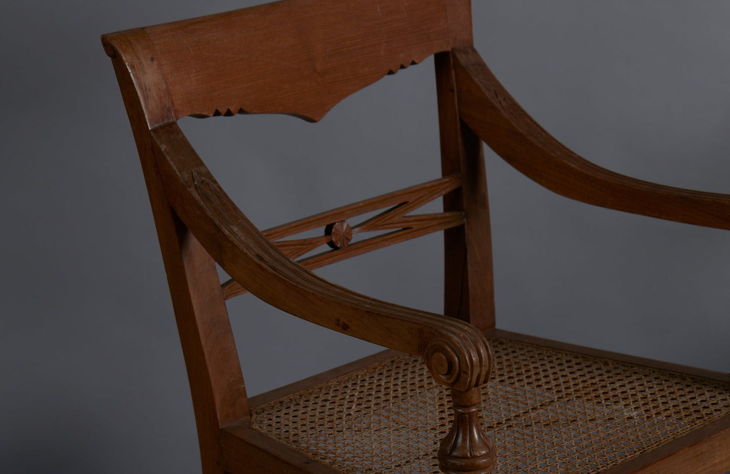 Light colored Teak Cane Seated Raffles Chairs from Java with Delicate Gadrooned Legs - detail