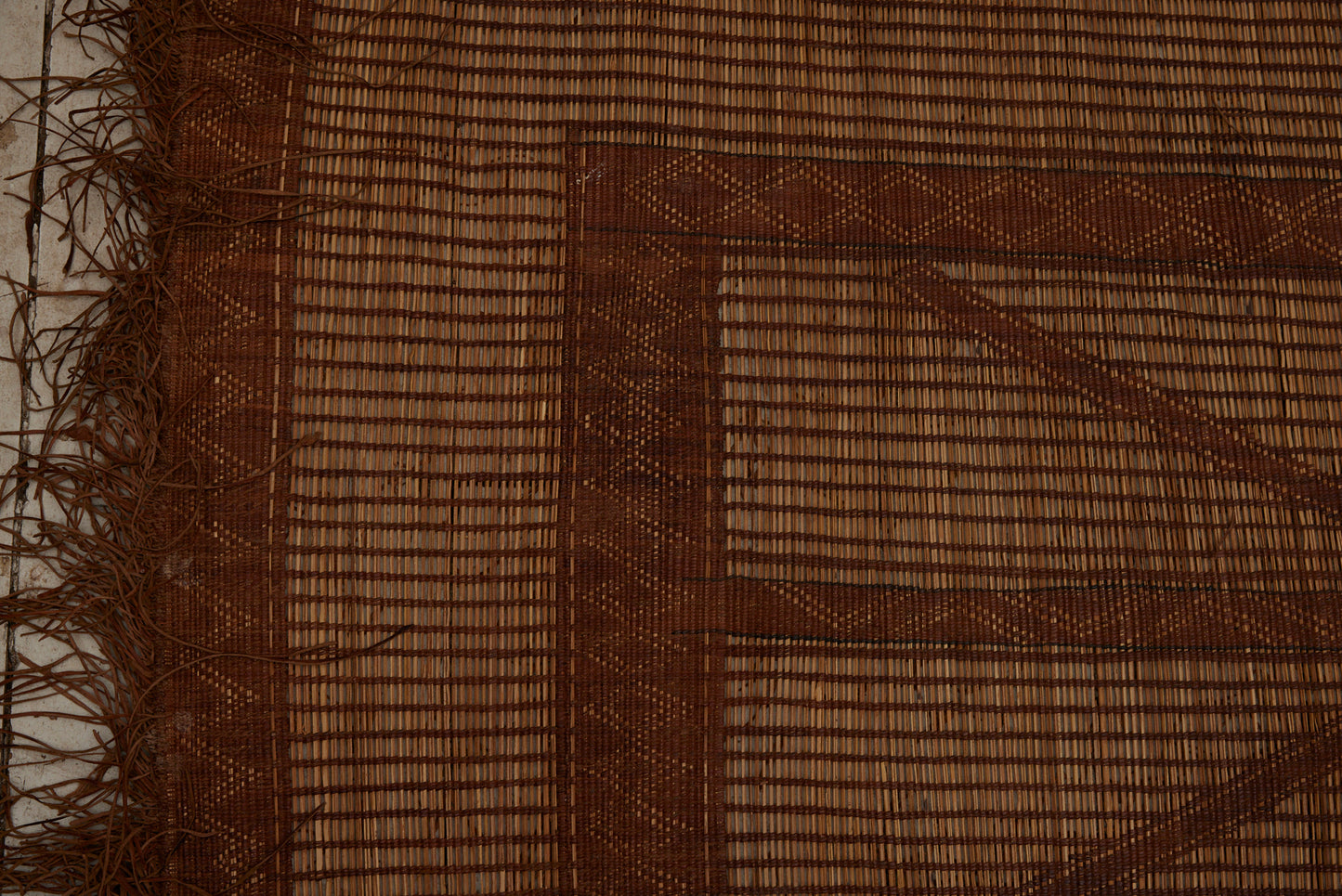 Medium Sized Early Tuareg Carpet Boasting a Central Field of Interlocking Diamonds.......... (6'2" x 7'2")