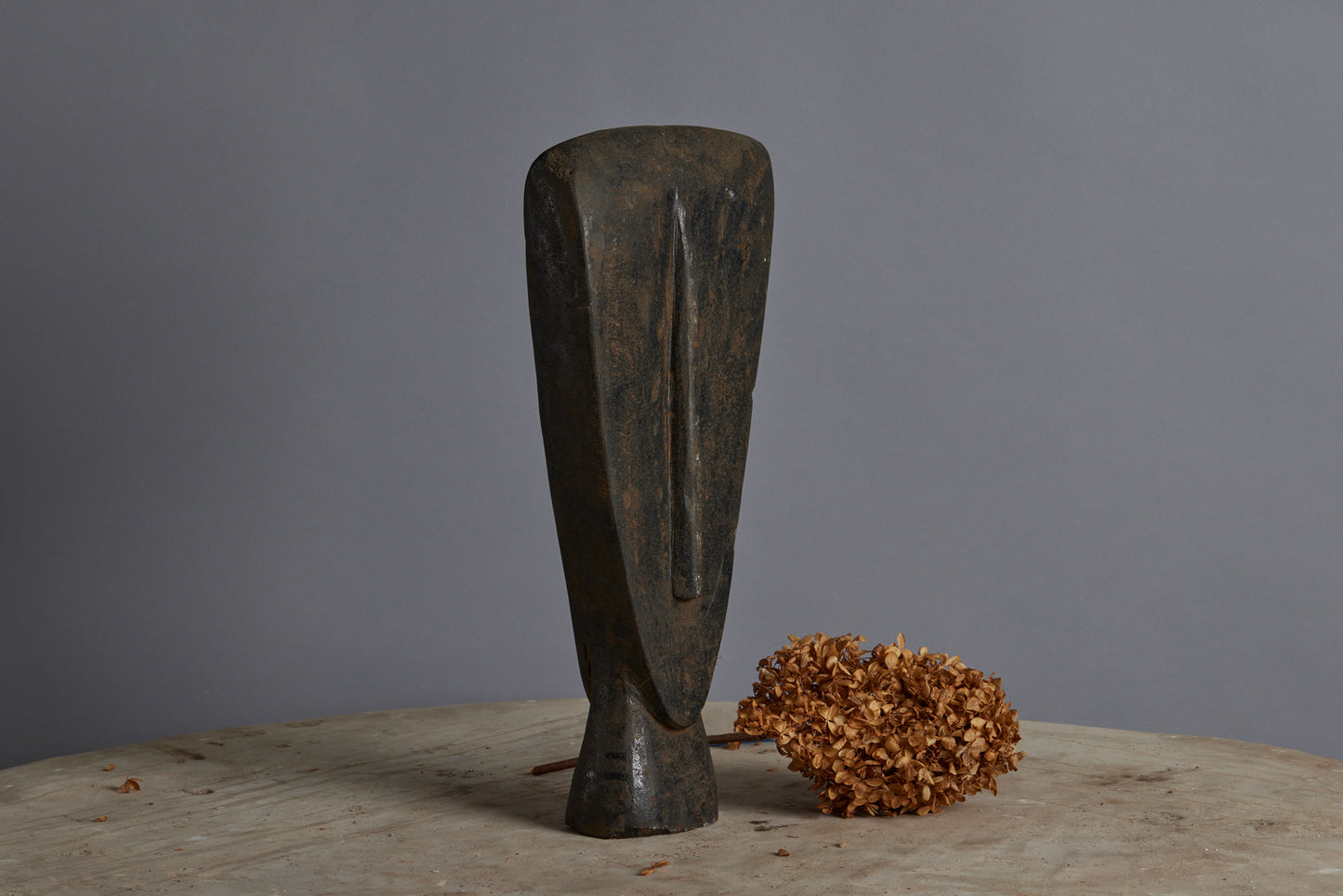 Primitive Carved Double Face Stone Head from the Island of Sumba