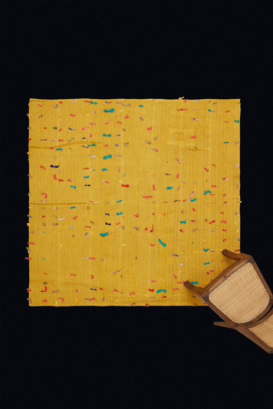 Squarish Saffron Colored Wall Hanging with an Old Patched Repair and Decorative Ribbon Decorations (5' 6" x 5' 8")