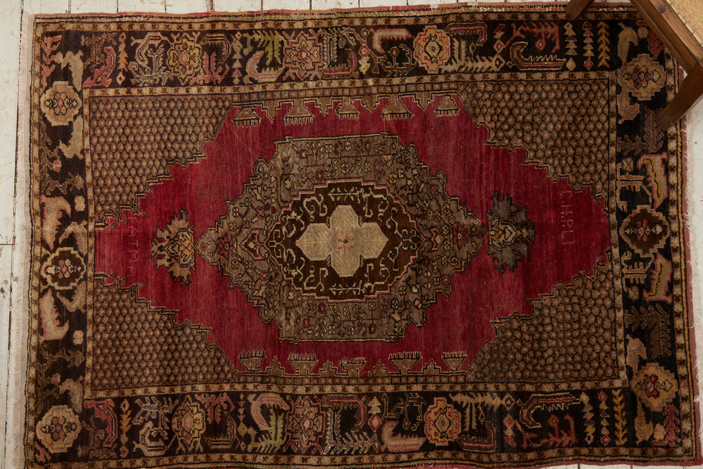 Small Cappadocia Carpet with a Central Medallion and a Red Background (4' 2" x 5' 11")