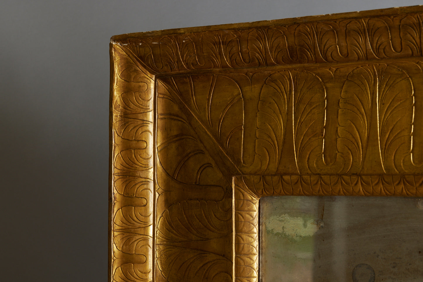 Large Egyptianesque 19th Century French Mirror with a Carved Wide Gilt Frame