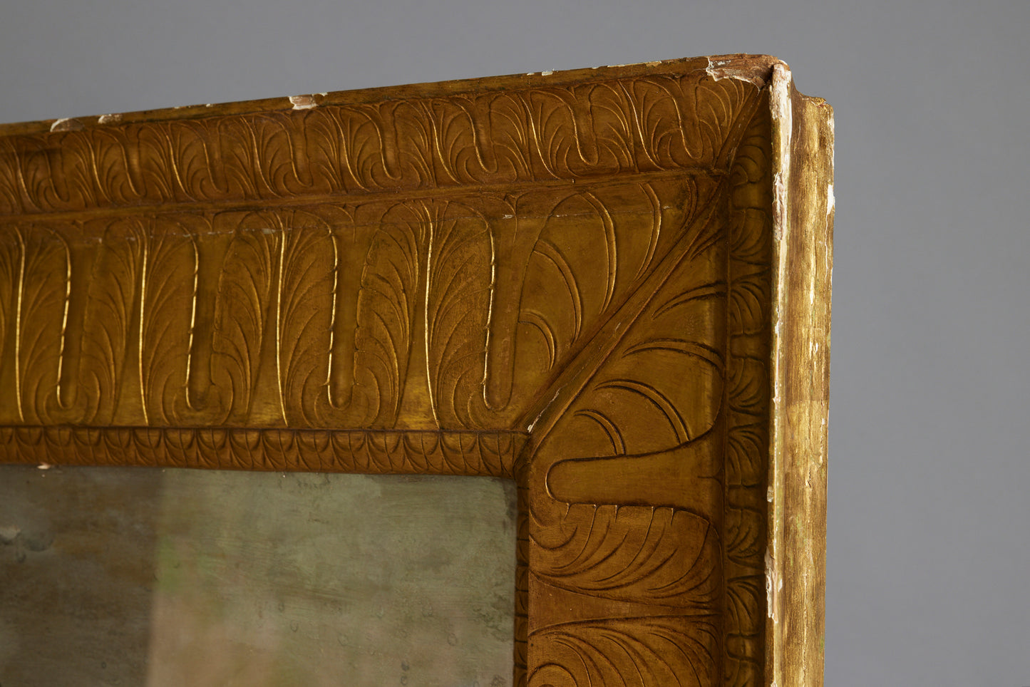 Large Egyptianesque 19th Century French Mirror with a Carved Wide Gilt Frame