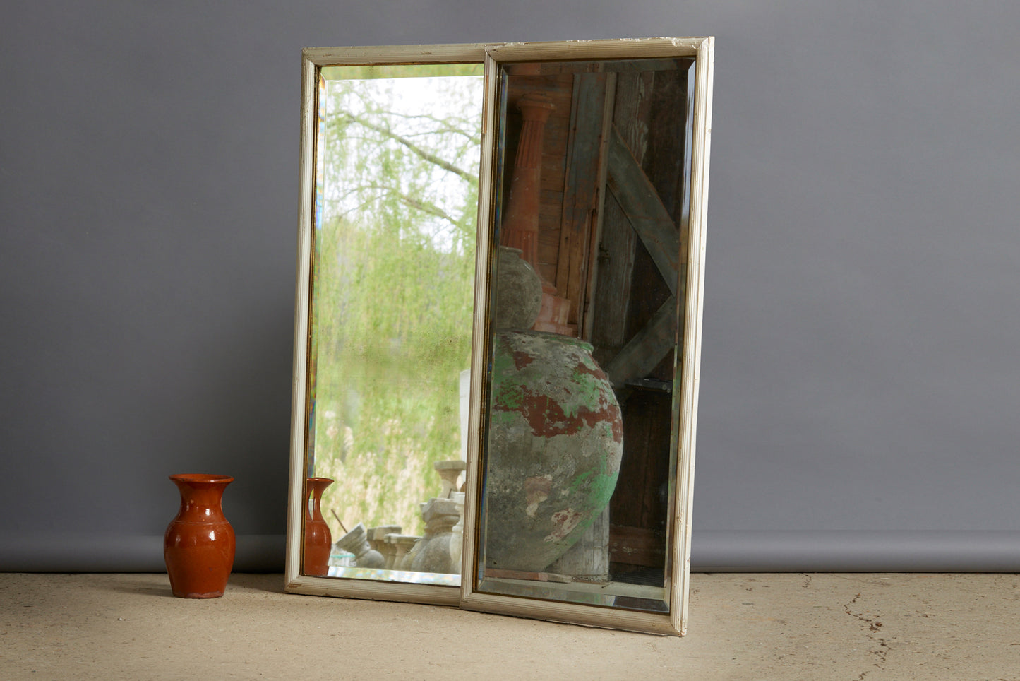 Pair of Early 20th Century French White Framed Mirrors with Beveled Glass