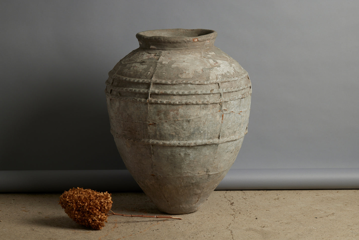 Terra Cotta Jar with Four Decorated Bands and Vertical Ribbing from Borneo