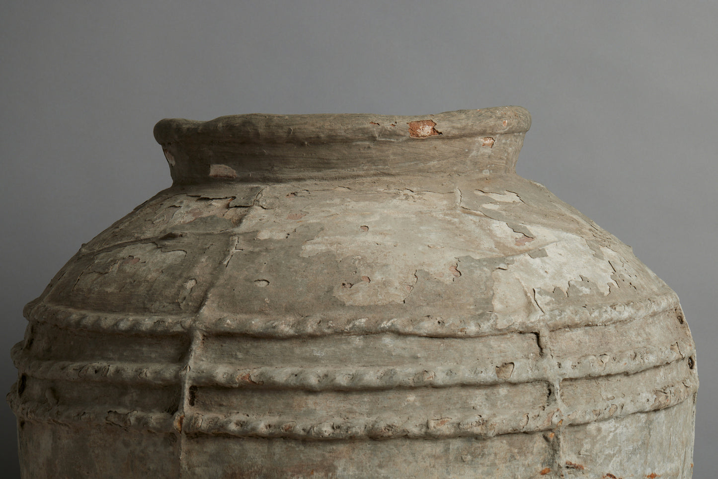 Terra Cotta Jar with Four Decorated Bands and Vertical Ribbing from Borneo
