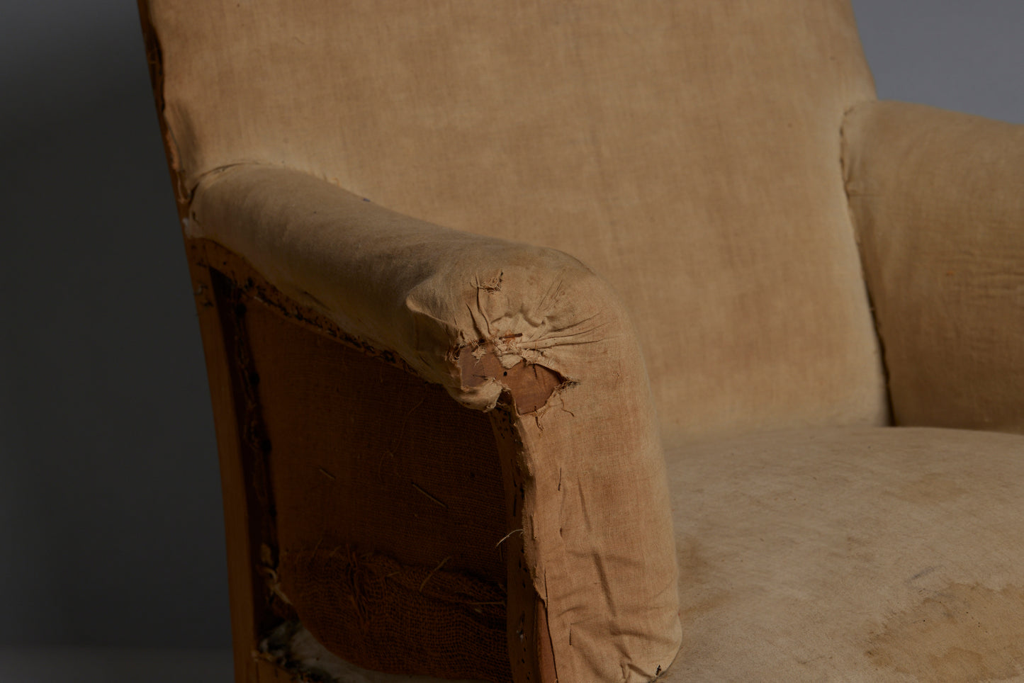 Edwardian Upholstered Armchair with Slightly Flared Arms & Rounded Shoulders