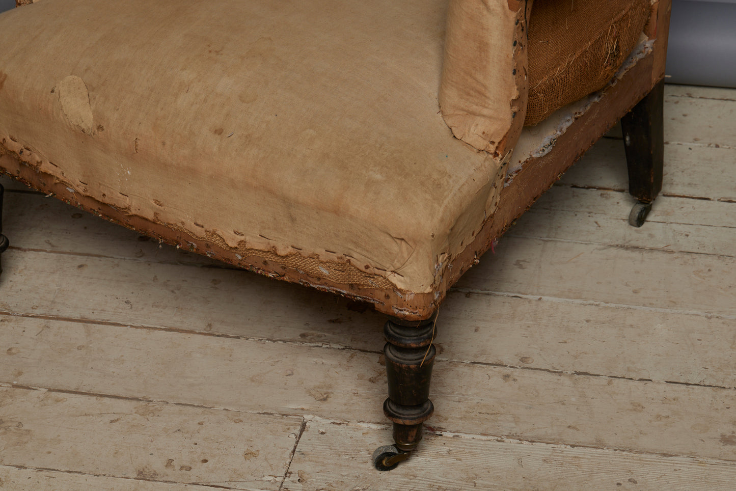Edwardian Upholstered Armchair with Slightly Flared Arms & Rounded Shoulders