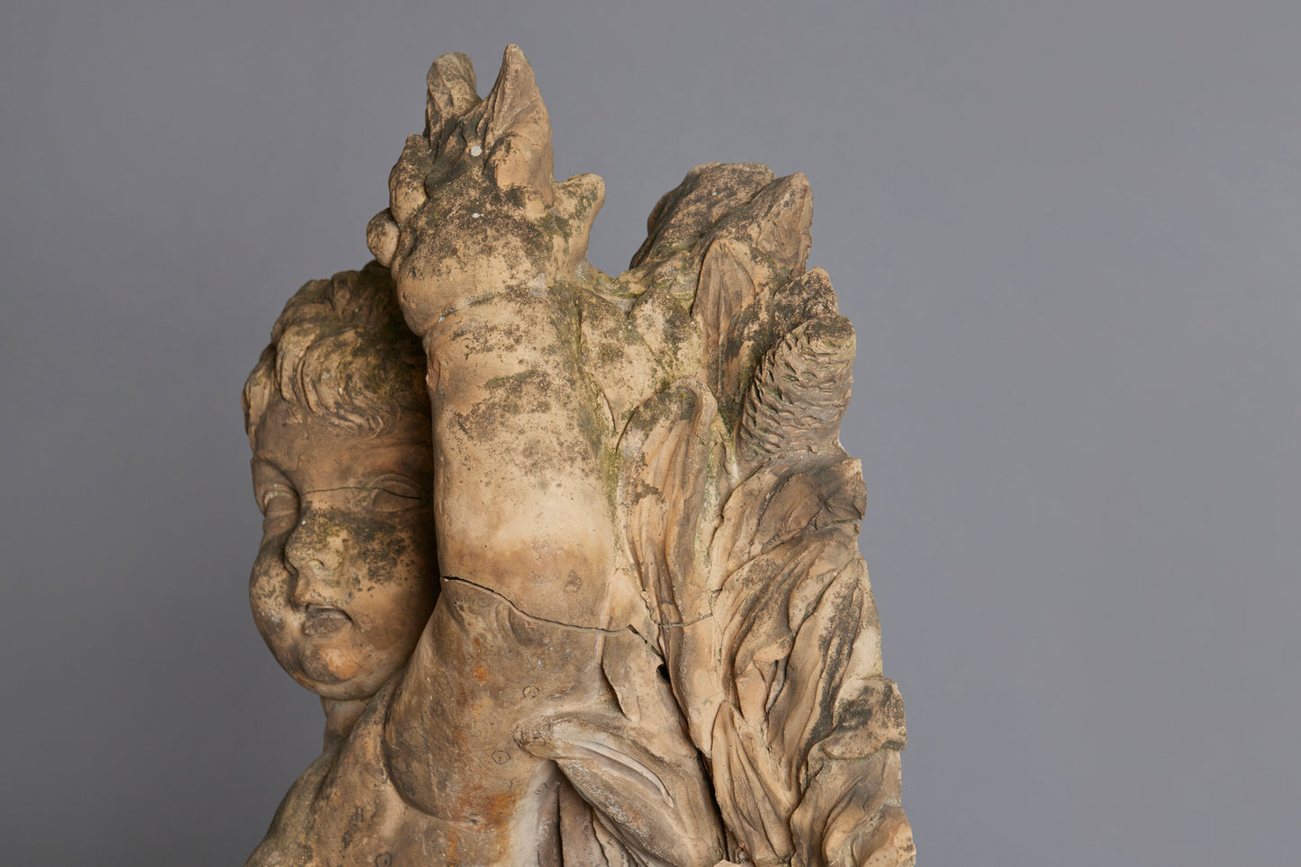 Mid to Late 18th Century Terra Cotta Fountainhead of a Putti Riding a Dolphin