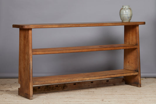 Beached Mid Century Modern French Bibliotec with Tapered Sides Thick Shelves and Champfered Corners