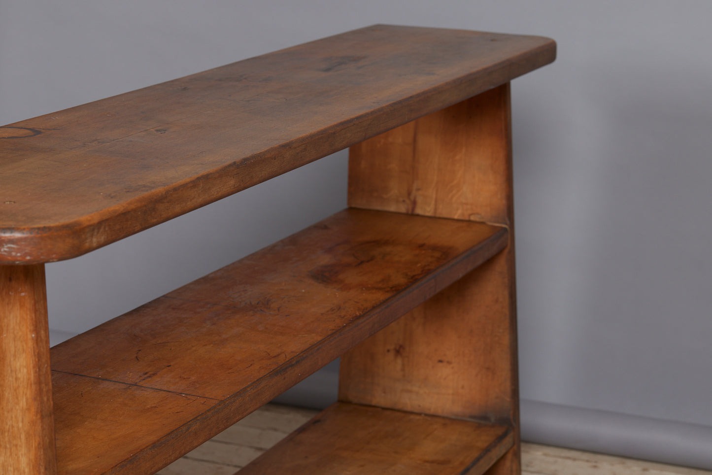 Beached Mid Century Modern French Bibliotec with Tapered Sides Thick Shelves and Champfered Corners