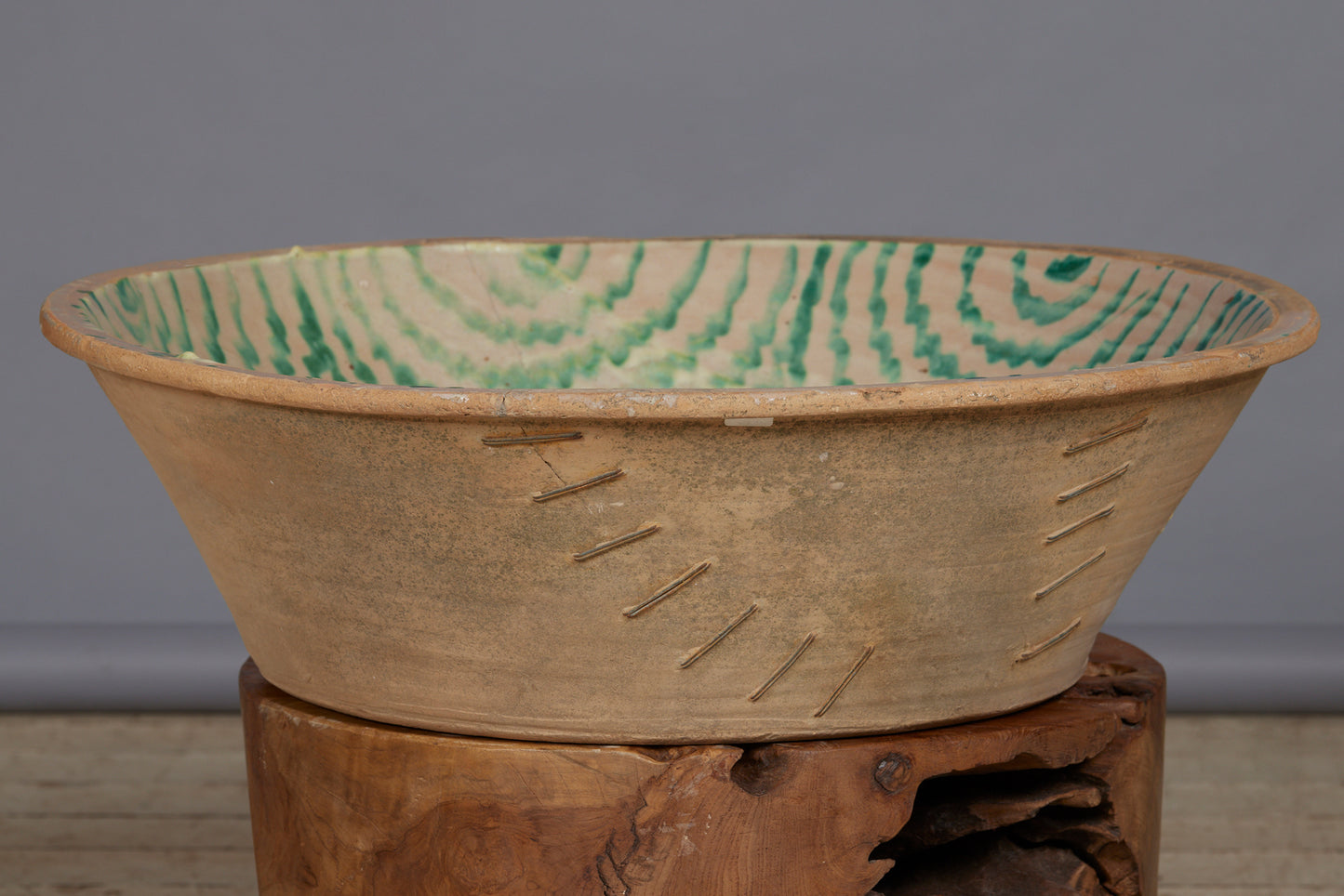 Late 18th Early 19th Cent. Spanish Lebrillo Bowl with a Green Fiance Decoration of a Tulip in the Center and Staple Repairs