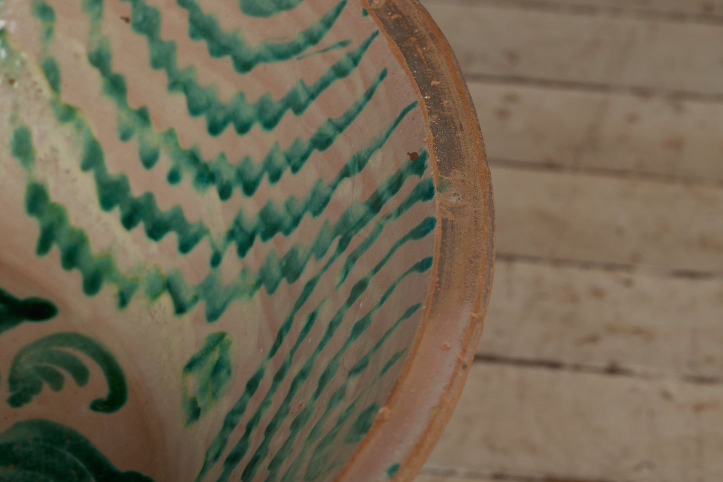 Late 18th Early 19th Cent. Spanish Lebrillo Bowl with a Green Fiance Decoration of a Tulip in the Center and Staple Repairs