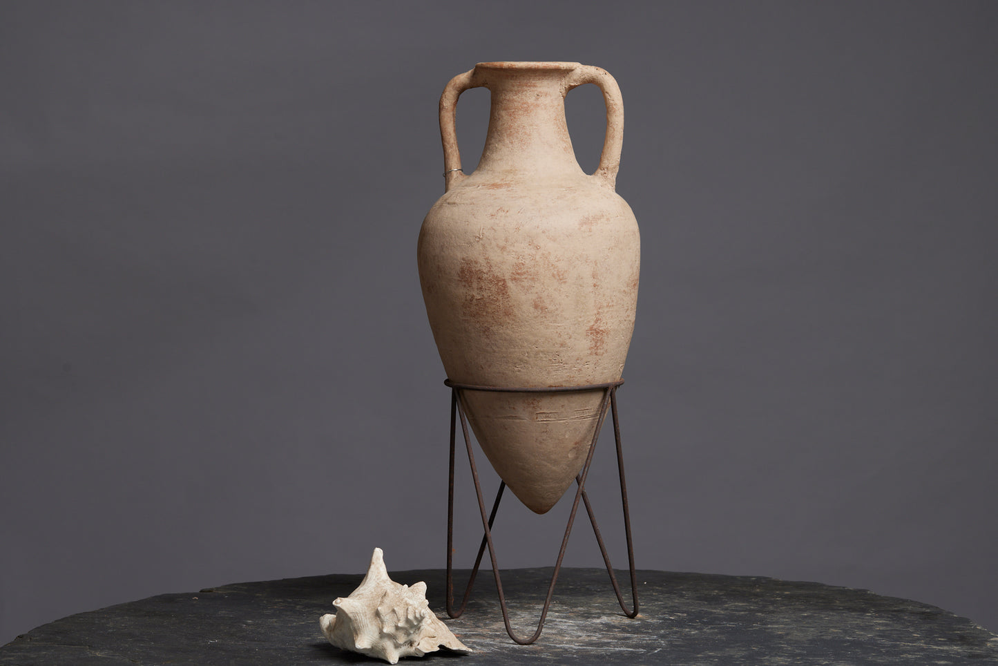 Greek Shaped Terra Cotta Amphora with an Iron Base