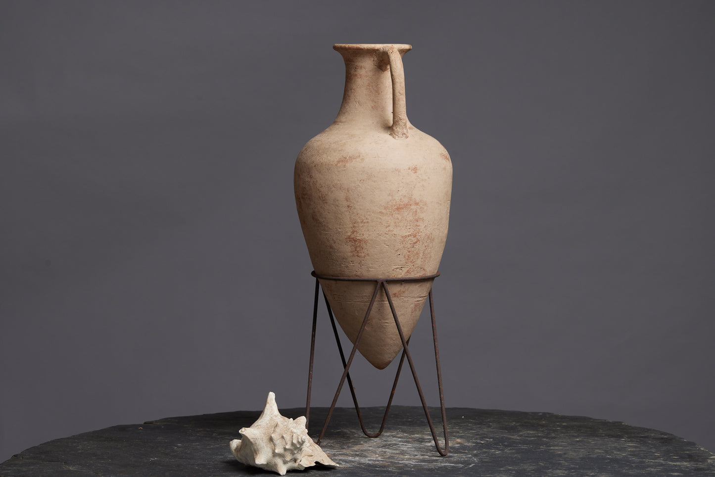 Greek Shaped Terra Cotta Amphora with an Iron Base