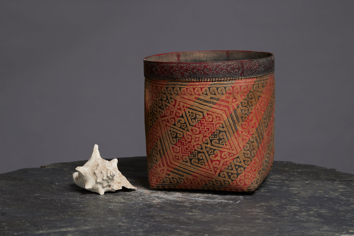 Very Large West Borneo Basket with a Classic Red and Black Decoration and a Carved Bamboo Band
