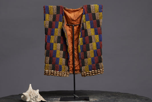 Rare Beadwork Shaman's Vest from Borneo Mounted on an Iron Base with a Cowrie Shell and Trade Beads