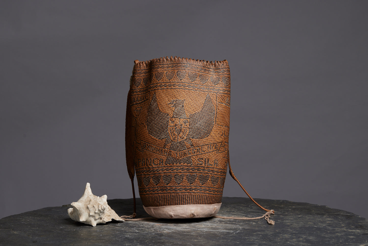 Large Woven Gathering Bag from Kalimantan with an Unusual Westerner Eagle Decoration with Cars