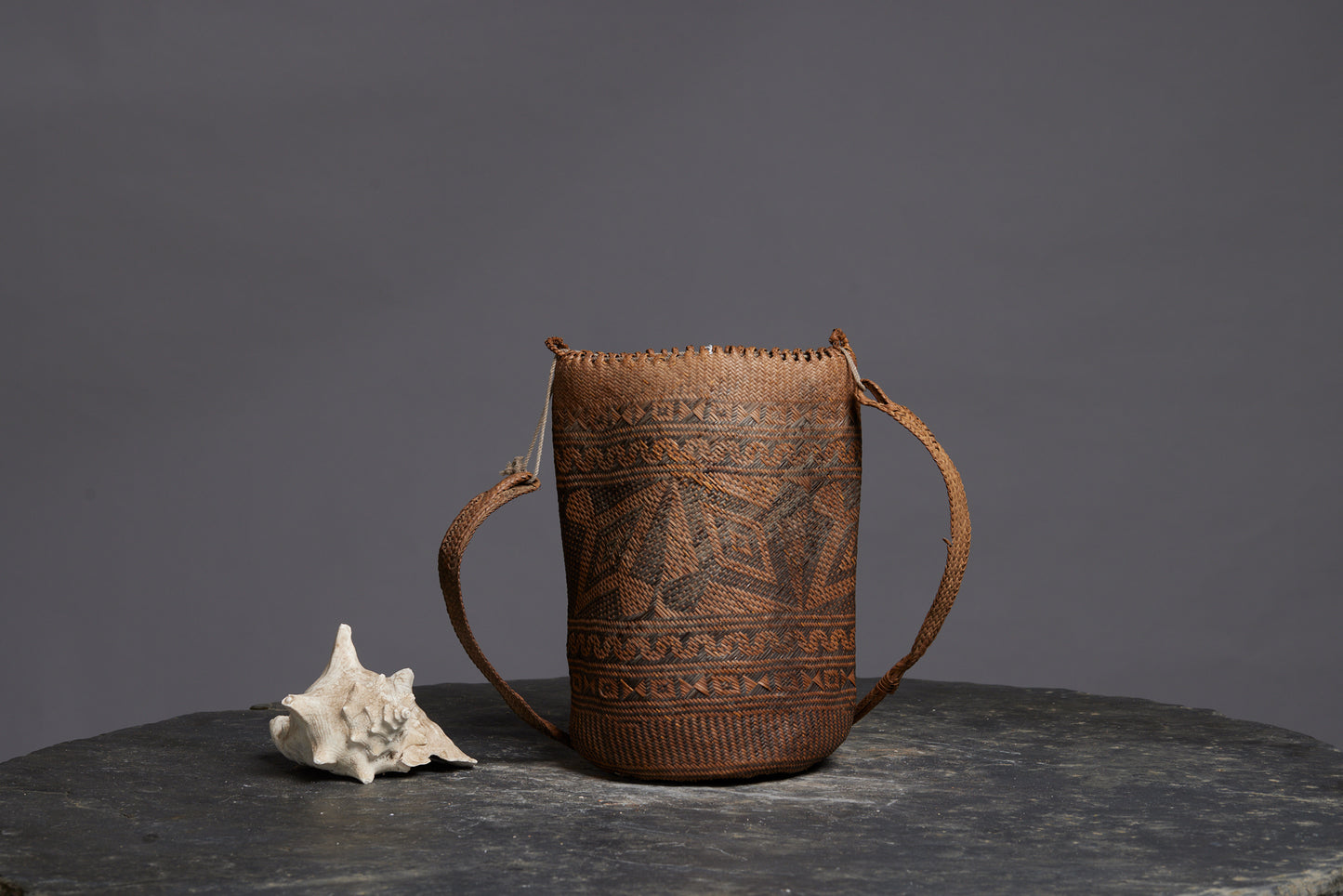Medium Woven Gathering Bag from Kalimantan with a Geometric Pattern and Lovely Braided Loops
