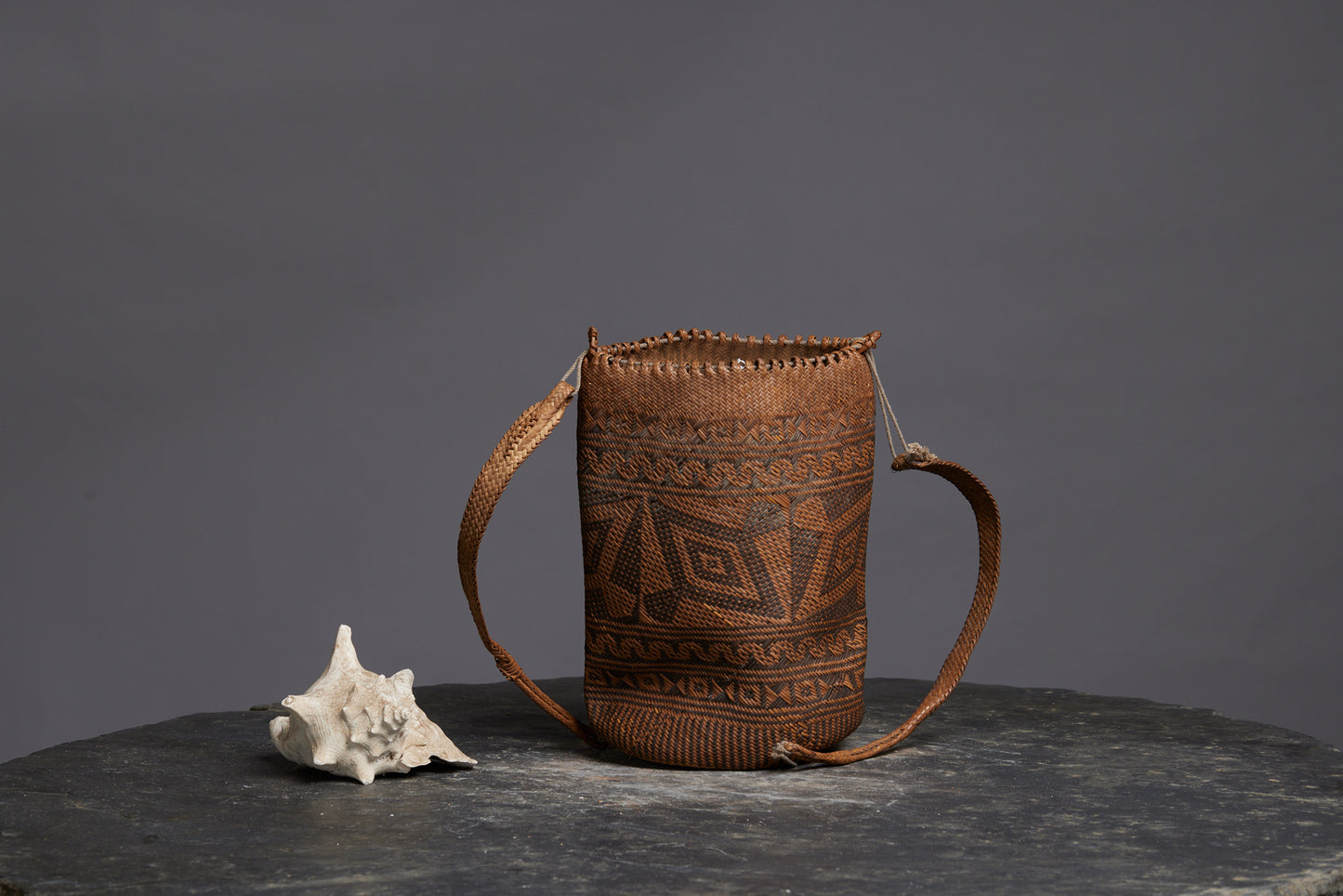 Medium Woven Gathering Bag from Kalimantan with a Geometric Pattern and Lovely Braided Loops