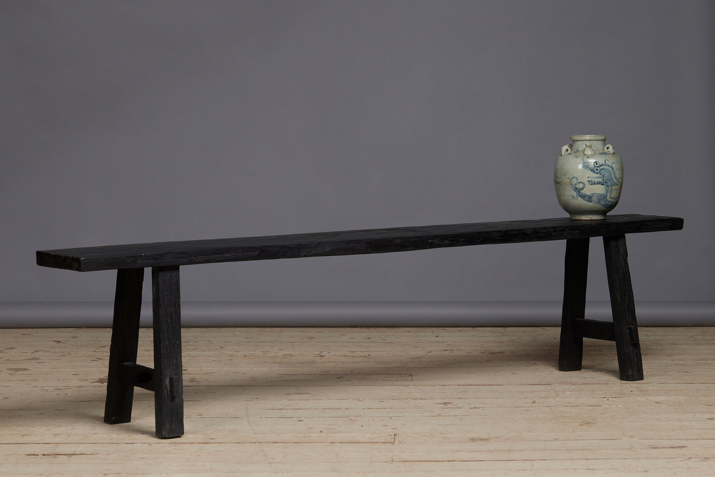 Ebonized Teak Bench with a Stretcher Base