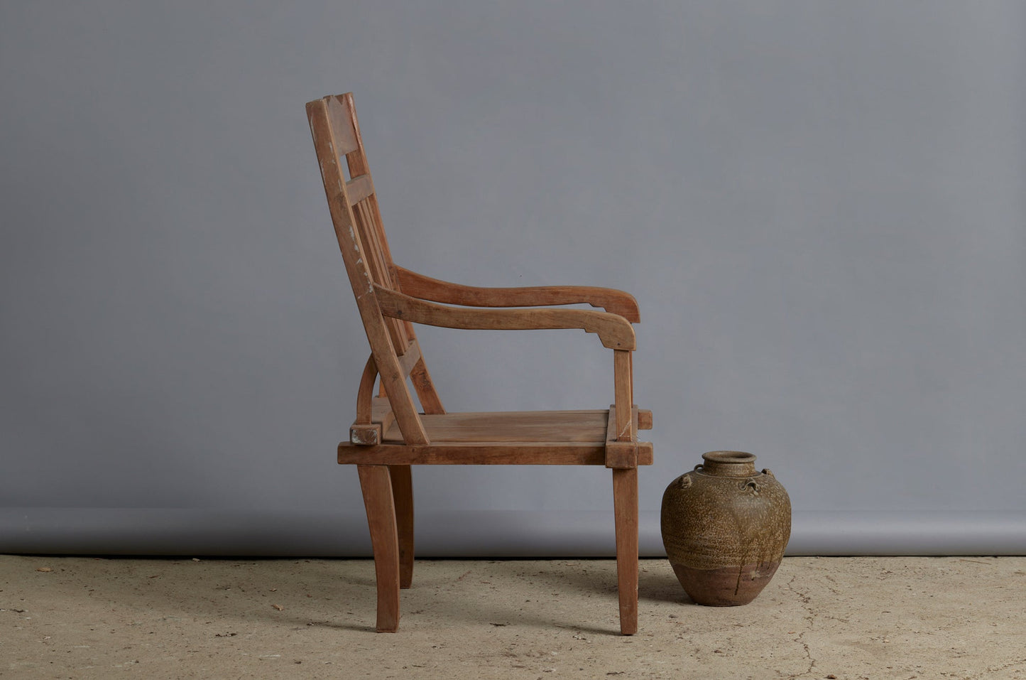 Early Dutch Colonial Teak Lounging Chair with Square Tapered Legs and Slatted Back from Sumatra
