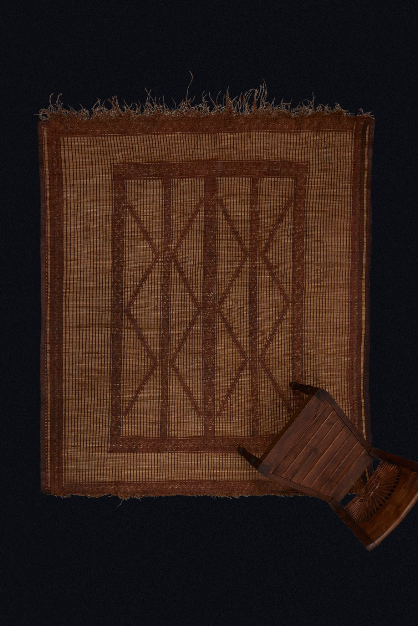 Medium Sized Early Tuareg Carpet Boasting a Central Field of Interlocking Diamonds.......... (6'2" x 7'2")