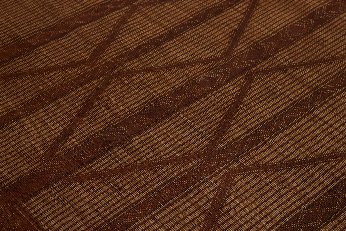 Medium Sized Early Tuareg Carpet Boasting a Central Field of Interlocking Diamonds.......... (6'2" x 7'2")