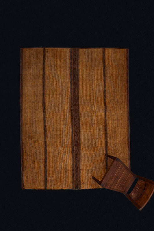 Medium Sized Early Coco Colored Tuareg Carpet with a Broad Center Decorative Stripe Flanked by 2 Smaller Decorative Stripes ..................(6'8" x 8'7")