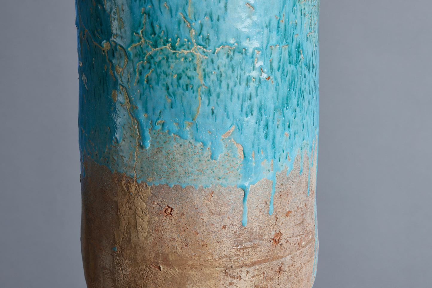Blue Green Glaze Stoneware Amphora with a Tripod Iron Base from the Island of Borneo