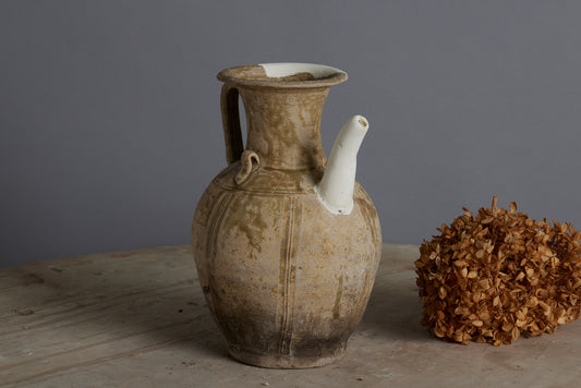 A Yue Wei Dynasty Teapot with Spatterware Decoration and Repairs to the Spout and Upper Lip