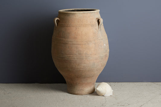 A large 19th Century Cretan Terra Cotta Oil Jar