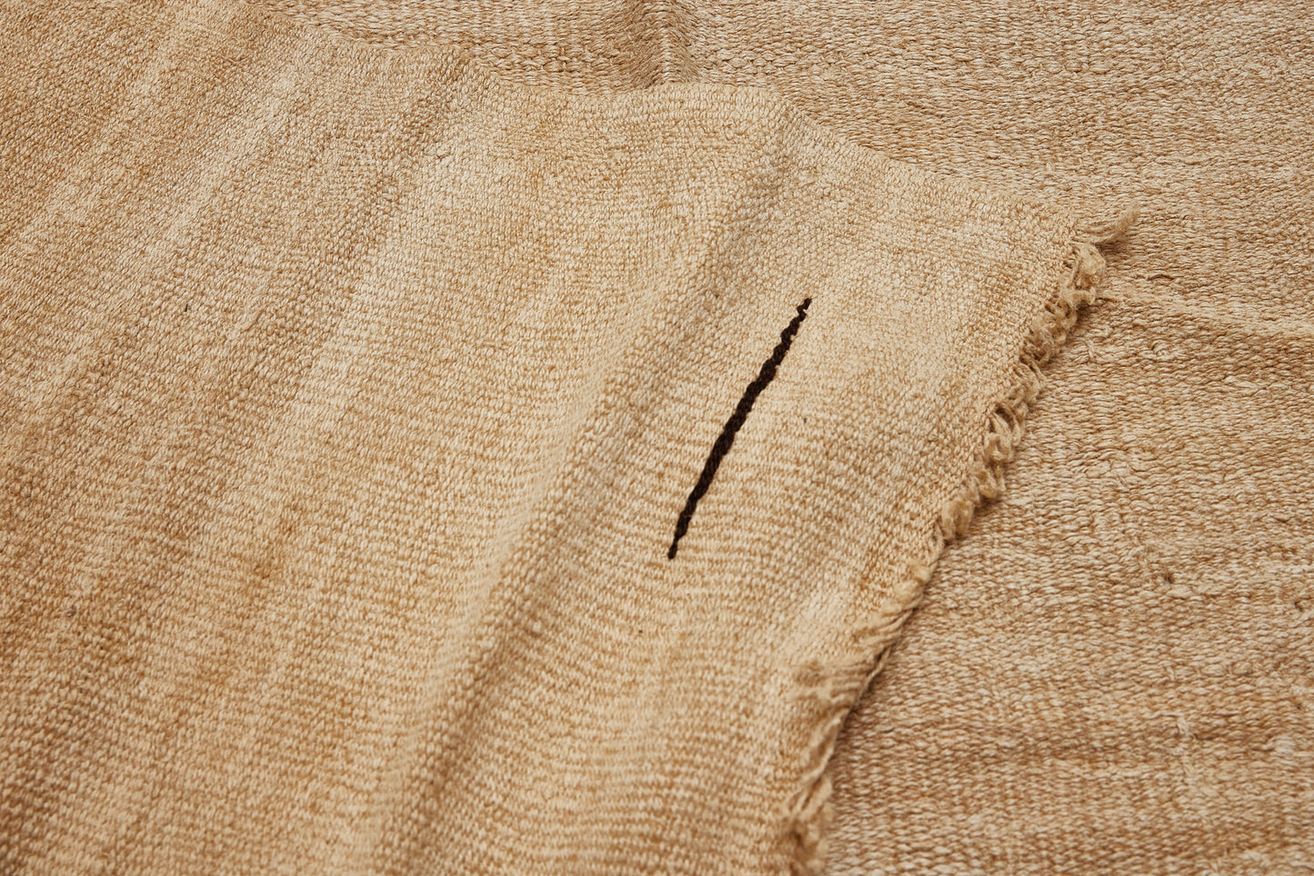 Medium All Cream Natural Hemp Carpet with a Central Floating Symbol in Brown Goat Hair ................... (5' 8" x 11' 4")
